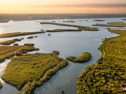 An aerial image of the Indian River Lagoon at sunset.