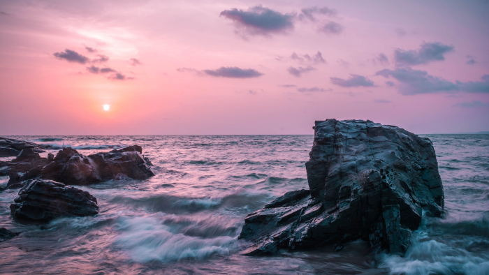 Ocean waves crashing on rocks