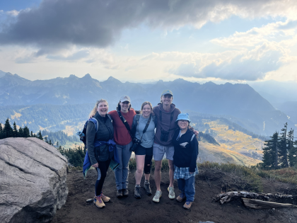 Director of Conservation Brittany Michalski with our 2025-26 Conservation Interns on a mountain top in Washington State.