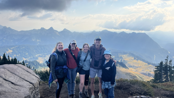 Director of Conservation Brittany Michalski with our 2025-26 Conservation Interns on a mountain top in Washington State.